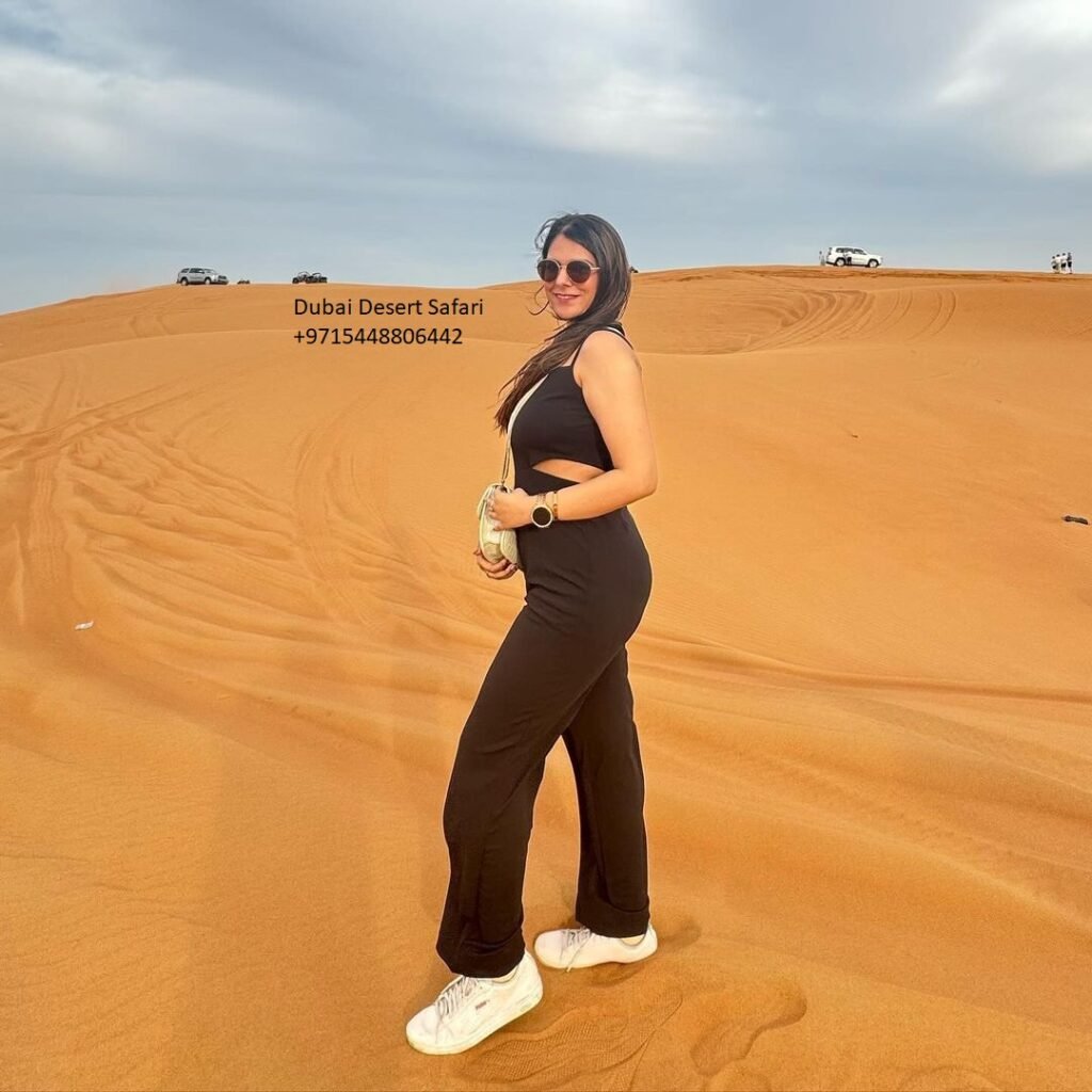 A women in desert while on VISIT DUBAI DESERT SAFAR Tour